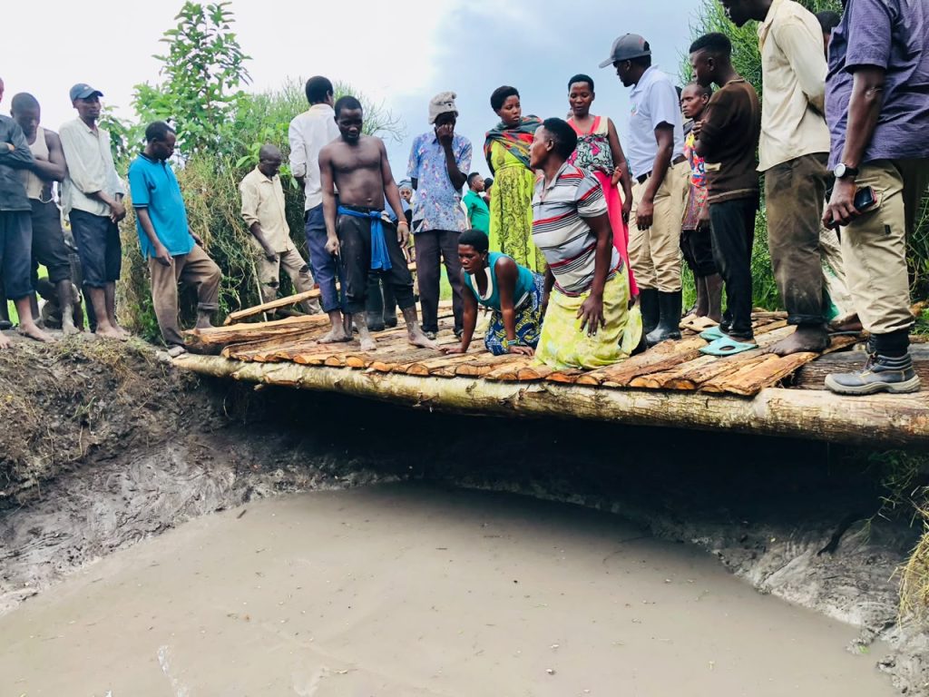 Local women sharing smiles of gratitude around the restored water source. This community well serves as the vital lifeline for households in the area and its restoration brings renewed hope, health and saved time for women and children.